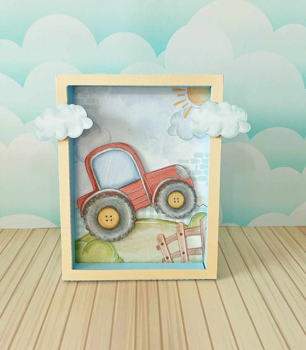 Arquivo de Corte Festa Trator Digital para Decoração 2 Quadro decorativo infantil com desenho de trator vermelho sobre colina e nuvens de papel