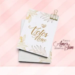 Caderno de votos com ilustrações botânicas douradas em um fundo listrado rosa.