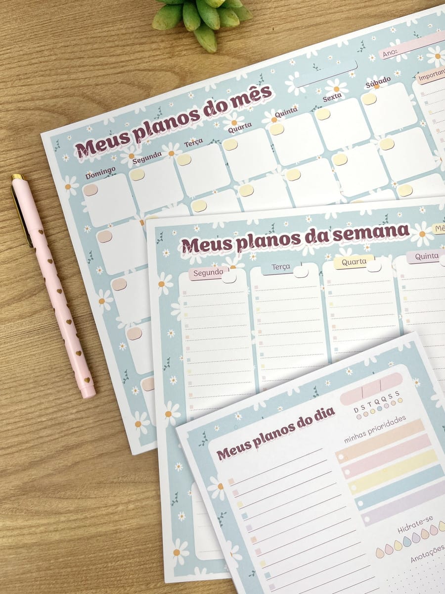 Kit Bloquinhos Digital Floral com Papéis para Imprimir 4 Três planejadores digitais com tema de margaridas para organização mensal, semanal e diária.
