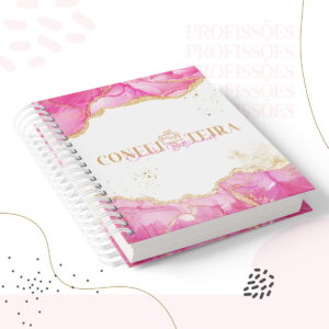 Caderno com capa rosa e branca com detalhes dourados e espiral branca.