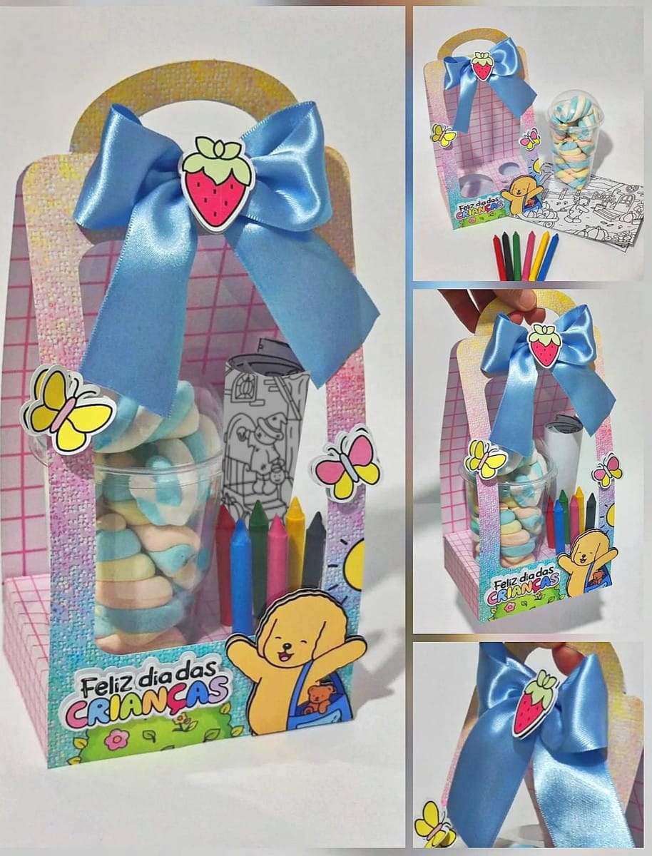 Kit Pintura Dia das Crianças Digital para Lembrancinhas 1 Sacola de papel decorada com laço azul, copo de doces e giz de cera.