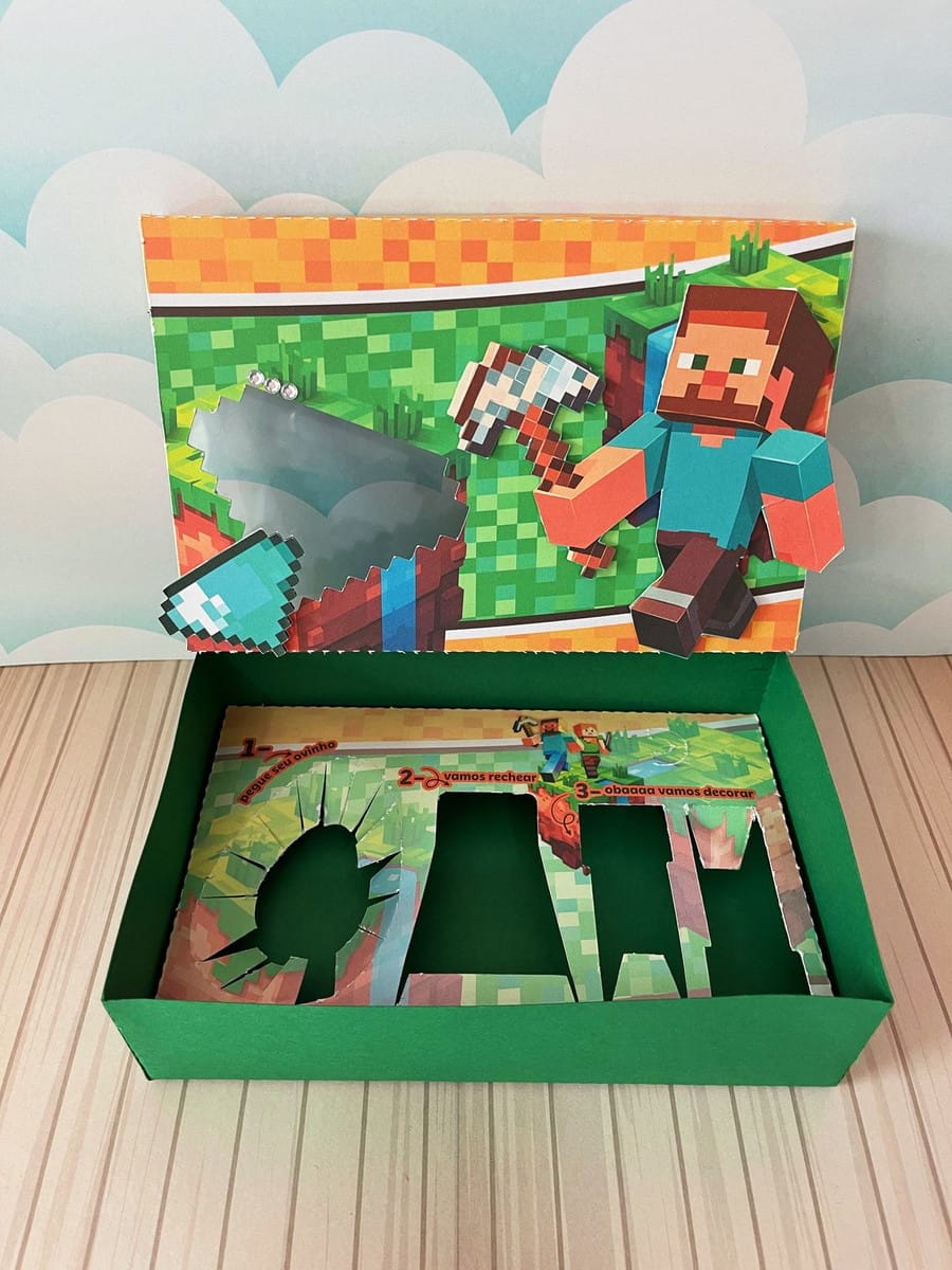Mini Confeiteiro Minecraft Arquivo Digital para Imprimir 2 Caixa de presente temática de jogo de blocos com personagens e ferramentas, e instruções internas.