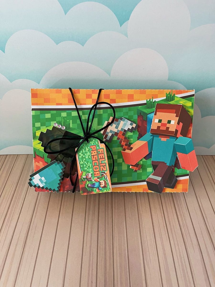 Mini Confeiteiro Minecraft Arquivo Digital para Imprimir 3 Caixa decorada com personagens e ferramentas pixelados estilo jogo de blocos, com tag "Feliz Páscoa".